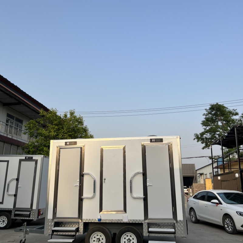 Outdoor multi-functional trailable mobile toilet