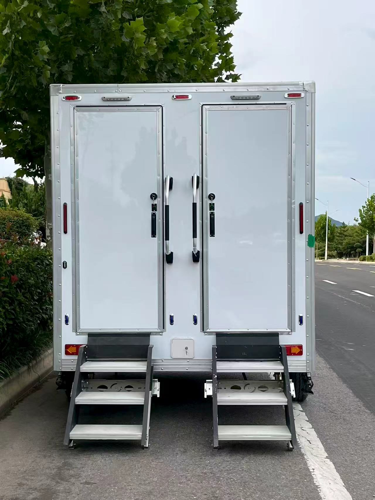 The double-door and double-ladder TAKE 3 mobile toilet easily solves the problem of outdoor toilet use